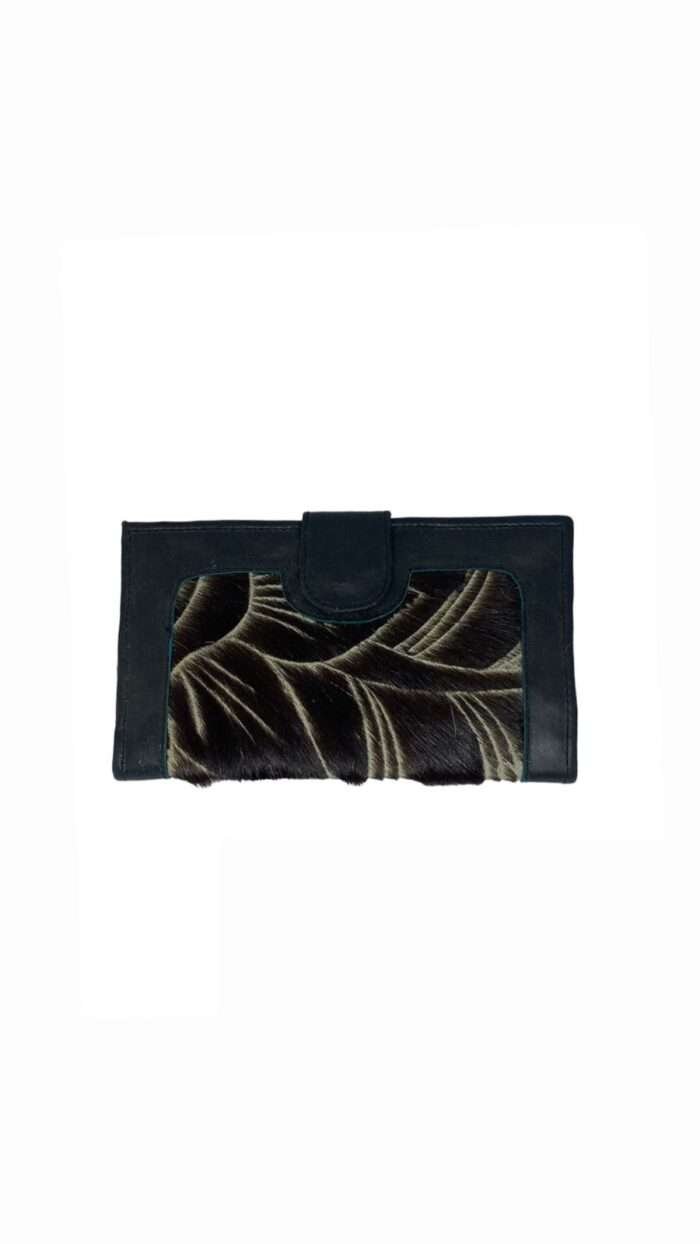 Elevate your style with our collection of high-quality genuine cowhide and other animal skin leather products, handcrafted by skilled artisans. Our leather collection includes bags, wallets, belts, shoes, jackets, and custom made leather goods, available in a variety of colors and finishes. Invest in a piece of luxury and durability with our leather collection.
