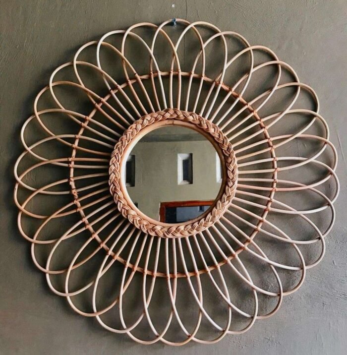 This hand-made mirror from Bali is made from high-quality materials, including rattan, and is both beautiful and durable. The mirror is affordable and can be purchased in bulk or customized to fit specific needs and preferences. It is a unique and natural addition to any home and will be treasured for years to come.