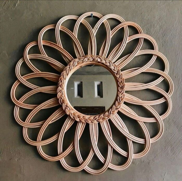 This hand-made mirror from Bali is made from high-quality materials, including rattan, and is both beautiful and durable. The mirror is affordable and can be purchased in bulk or customized to fit specific needs and preferences. It is a unique and natural addition to any home and will be treasured for years to come.