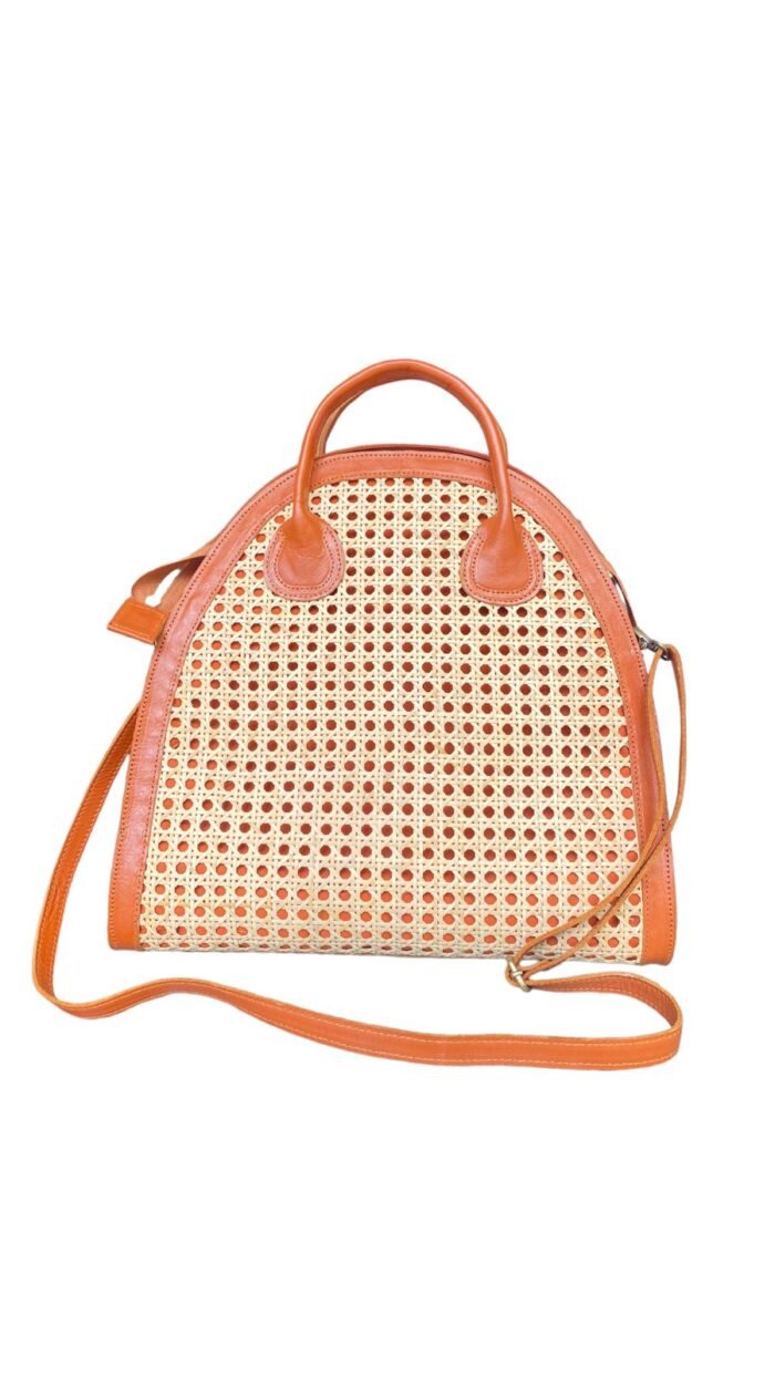 This stylish handbag is handcrafted in Bali using natural rattan material, The intricate weave creates a unique, one-of-a-kind design that is perfect for adding a touch of rustic charm to any outfit. <span style="font-weight: 400">Shipping options are as follows</span> <table style="height: 433px" width="357"> <tbody> <tr> <td colspan="2"><b>Bali Bya Air</b></td> </tr> <tr> <td><span style="font-weight: 400">Australia</span></td> <td><span style="font-weight: 400">$45 per satchel up to 1kg</span> <span style="font-weight: 400">Express 4 - 6 days</span></td> </tr> <tr> <td colspan="2"><b>Bali Bya Box</b></td> </tr> <tr> <td><span style="font-weight: 400">Australia</span></td> <td><span style="font-weight: 400">$179 per box up to 30kg</span> <span style="font-weight: 400">Cargo 8 - 10 weeks</span></td> </tr> <tr> <td colspan="2"><b>Bali Bya Freight</b></td> </tr> <tr> <td><span style="font-weight: 400">Australia</span></td> <td><span style="font-weight: 400">$700 per m3</span> <span style="font-weight: 400">Cargo 8 - 10 weeks</span></td> </tr> </tbody> </table> <strong>The products will be packed safely before sending it to your home!</strong>