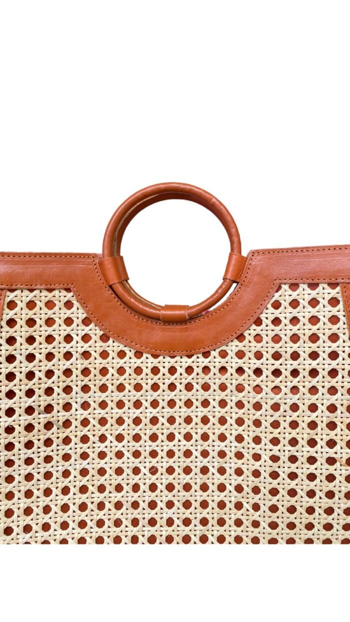 This stylish handbag is handcrafted in Bali using natural rattan material, The intricate weave creates a unique, one-of-a-kind design that is perfect for adding a touch of rustic charm to any outfit. <span style="font-weight: 400">Shipping options are as follows | Shipping Weight : 1.2 Kg.</span> <table style="height: 433px" width="357"> <tbody> <tr> <td colspan="2"><b>Bali Bya Air</b></td> </tr> <tr> <td><span style="font-weight: 400">Australia</span></td> <td><span style="font-weight: 400">$45 per satchel up to 1kg</span> <span style="font-weight: 400">Express 4 - 6 days</span></td> </tr> <tr> <td colspan="2"><b>Bali Bya Box</b></td> </tr> <tr> <td><span style="font-weight: 400">Australia</span></td> <td><span style="font-weight: 400">$179 per box up to 30kg</span> <span style="font-weight: 400">Cargo 8 - 10 weeks</span></td> </tr> <tr> <td colspan="2"><b>Bali Bya Freight</b></td> </tr> <tr> <td><span style="font-weight: 400">Australia</span></td> <td><span style="font-weight: 400">$700 per m3</span> <span style="font-weight: 400">Cargo 8 - 10 weeks</span></td> </tr> </tbody> </table> <strong>The products will be packed safely before sending it to your home!</strong>