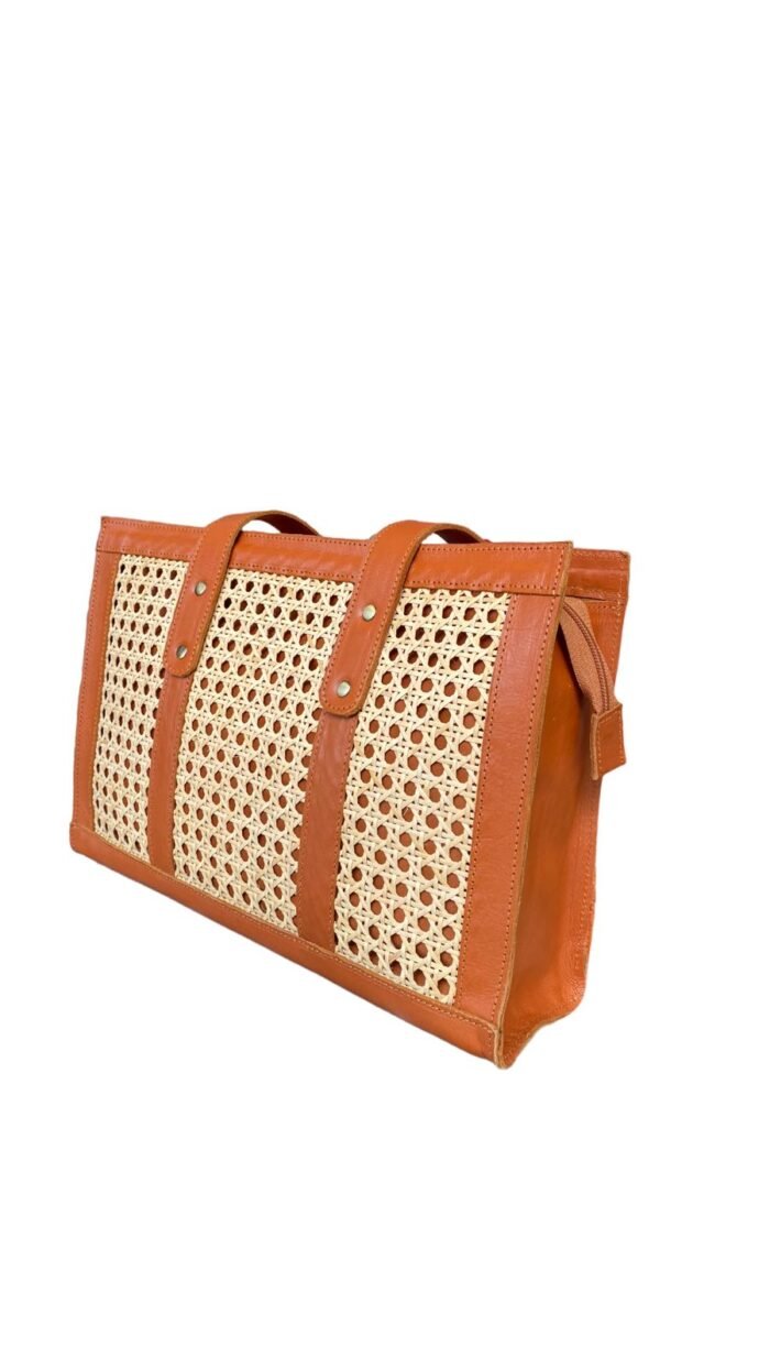 This stylish handbag is handcrafted in Bali using natural rattan material, The intricate weave creates a unique, one-of-a-kind design that is perfect for adding a touch of rustic charm to any outfit. <span style="font-weight: 400">Shipping options are as follows | Shipping Weight : 1.1 Kg.</span> <table style="height: 433px" width="357"> <tbody> <tr> <td colspan="2"><b>Bali Bya Air</b></td> </tr> <tr> <td><span style="font-weight: 400">Australia</span></td> <td><span style="font-weight: 400">$45 per satchel up to 1kg</span> <span style="font-weight: 400">Express 4 - 6 days</span></td> </tr> <tr> <td colspan="2"><b>Bali Bya Box</b></td> </tr> <tr> <td><span style="font-weight: 400">Australia</span></td> <td><span style="font-weight: 400">$179 per box up to 30kg</span> <span style="font-weight: 400">Cargo 8 - 10 weeks</span></td> </tr> <tr> <td colspan="2"><b>Bali Bya Freight</b></td> </tr> <tr> <td><span style="font-weight: 400">Australia</span></td> <td><span style="font-weight: 400">$700 per m3</span> <span style="font-weight: 400">Cargo 8 - 10 weeks</span></td> </tr> </tbody> </table> <strong>The products will be packed safely before sending it to your home!</strong>