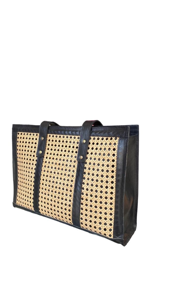 This stylish handbag is handcrafted in Bali using natural rattan material, The intricate weave creates a unique, one-of-a-kind design that is perfect for adding a touch of rustic charm to any outfit. <span style="font-weight: 400;">Shipping options are as follows | Shipping Weight : 1.1 Kg.</span> <table style="height: 433px;" width="357"> <tbody> <tr> <td colspan="2"><b>Bali Bya Air</b></td> </tr> <tr> <td><span style="font-weight: 400;">Australia</span></td> <td><span style="font-weight: 400;">$45 per satchel up to 1kg</span> <span style="font-weight: 400;">Express 4 - 6 days</span></td> </tr> <tr> <td colspan="2"><b>Bali Bya Box</b></td> </tr> <tr> <td><span style="font-weight: 400;">Australia</span></td> <td><span style="font-weight: 400;">$179 per box up to 30kg</span> <span style="font-weight: 400;">Cargo 8 - 10 weeks</span></td> </tr> <tr> <td colspan="2"><b>Bali Bya Freight</b></td> </tr> <tr> <td><span style="font-weight: 400;">Australia</span></td> <td><span style="font-weight: 400;">$700 per m3</span> <span style="font-weight: 400;">Cargo 8 - 10 weeks</span></td> </tr> </tbody> </table> <strong>The products will be packed safely before sending it to your home!</strong>