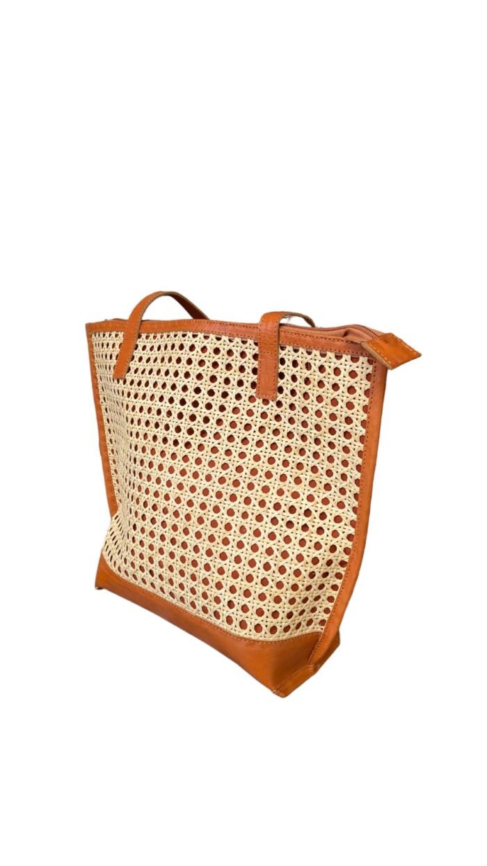 This stylish handbag is handcrafted in Bali using natural rattan material, The intricate weave creates a unique, one-of-a-kind design that is perfect for adding a touch of rustic charm to any outfit. <span style="font-weight: 400">Shipping options are as follows</span> <table style="height: 433px" width="357"> <tbody> <tr> <td colspan="2"><b>Bali Bya Air</b></td> </tr> <tr> <td><span style="font-weight: 400">Australia</span></td> <td><span style="font-weight: 400">$45 per satchel up to 1kg</span> <span style="font-weight: 400">Express 4 - 6 days</span></td> </tr> <tr> <td colspan="2"><b>Bali Bya Box</b></td> </tr> <tr> <td><span style="font-weight: 400">Australia</span></td> <td><span style="font-weight: 400">$179 per box up to 30kg</span> <span style="font-weight: 400">Cargo 8 - 10 weeks</span></td> </tr> <tr> <td colspan="2"><b>Bali Bya Freight</b></td> </tr> <tr> <td><span style="font-weight: 400">Australia</span></td> <td><span style="font-weight: 400">$700 per m3</span> <span style="font-weight: 400">Cargo 8 - 10 weeks</span></td> </tr> </tbody> </table> <strong>The products will be packed safely before sending it to your home!</strong>