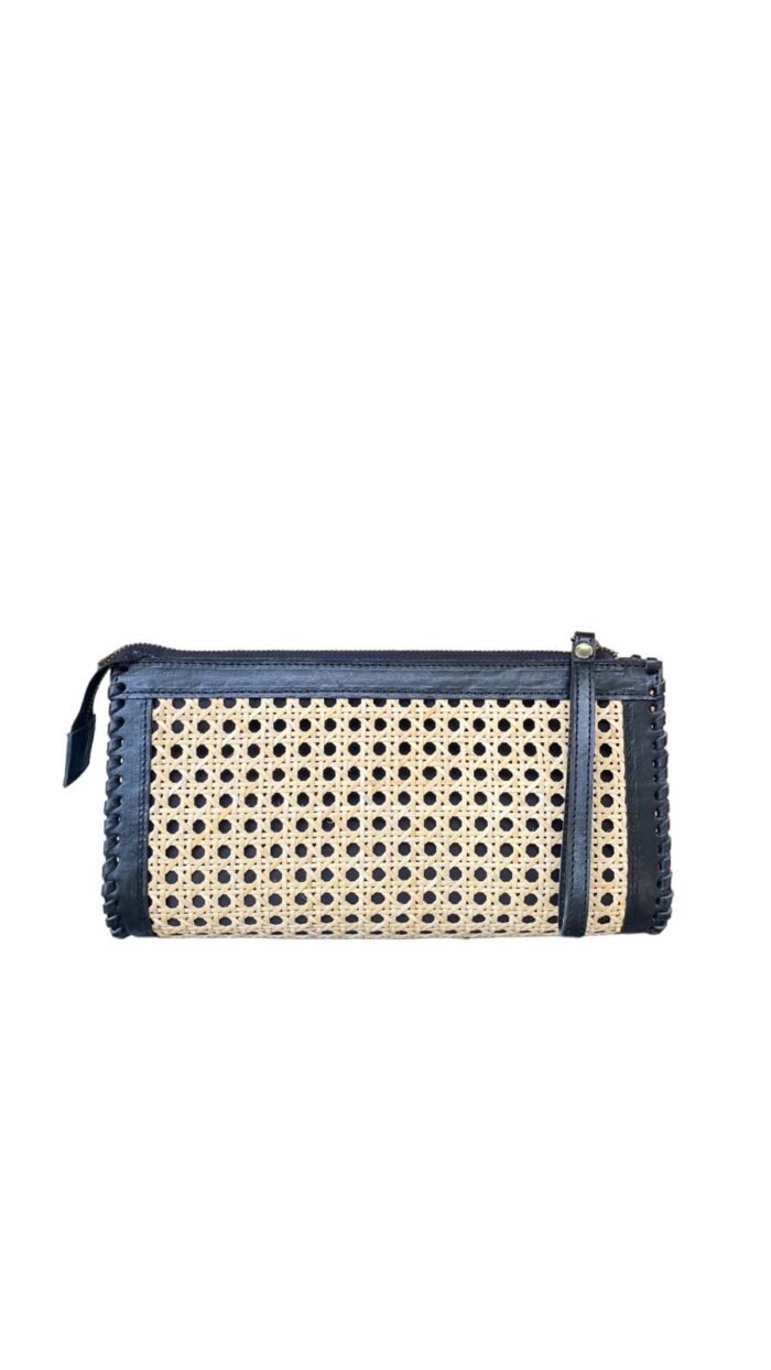 This stylish handbag is handcrafted in Bali using natural rattan material, The intricate weave creates a unique, one-of-a-kind design that is perfect for adding a touch of rustic charm to any outfit.