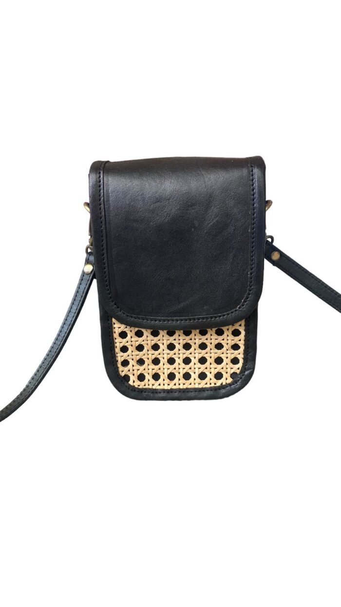 This stylish handbag is handcrafted in Bali using natural rattan material, The intricate weave creates a unique, one-of-a-kind design that is perfect for adding a touch of rustic charm to any outfit.