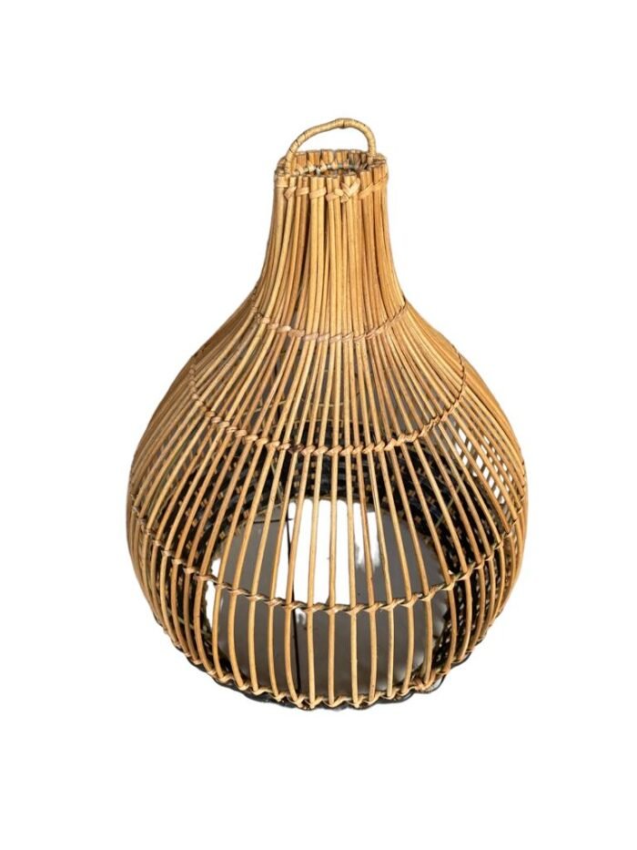 H:30 cm W:12 cm (Mix black Syntethic Rattan) Add a touch of tropical elegance to your home with our collection of handcrafted rattan lamp shades, made by skilled artisans in Bali. Our collection includes a variety of designs, from classic to modern and customizable options are also available. These lamp shades are not only functional but also a decorative piece that can add character and style to any room in your home. Invest in quality and artistry with our collection of rattan lamp shades.