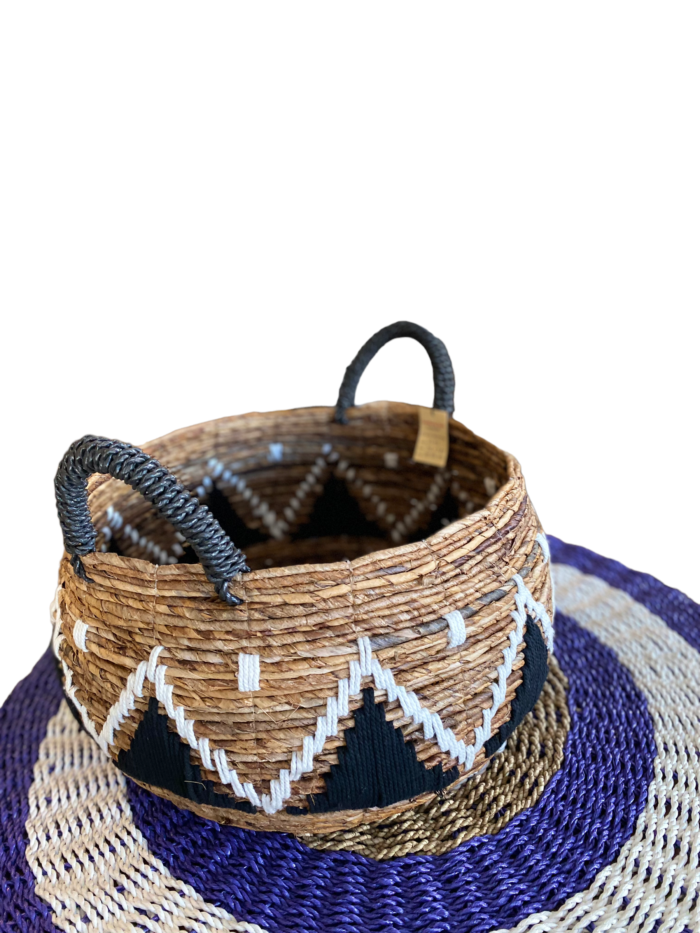 Handmade in Bali, the Bali Wicker Natural Basket offers a unique blend of style and functionality. Ideal for storing household items or as a stylish accessory for outdoor activities. Size : Heigh : 23 cm , Diameter 30 cm | Shipping Weight : 3 kg