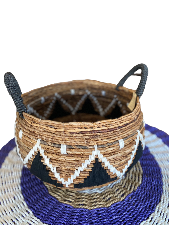 Handmade in Bali, the Bali Wicker Natural Basket offers a unique blend of style and functionality. Ideal for storing household items or as a stylish accessory for outdoor activities. Size : Heigh : 23 cm , Diameter 30 cm | Shipping Weight : 3 kg