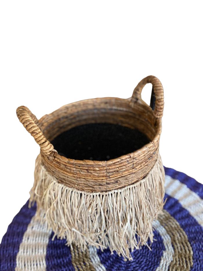 Handmade in Bali, the Bali Wicker Natural Basket offers a unique blend of style and functionality. Ideal for storing household items or as a stylish accessory for outdoor activities. Size :Height 34 cm , Diameter 33 cm | Shipping Weight : 5 kg