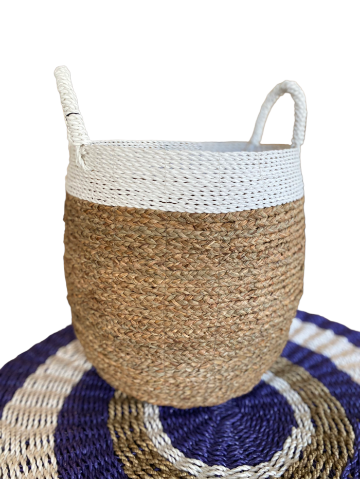 Handmade in Bali, the Bali Wicker Natural Basket offers a unique blend of style and functionality. Ideal for storing household items or as a stylish accessory for outdoor activities. Size : Height 40 cm , Diameter 35 cm | Shipping Weight : 5 kg