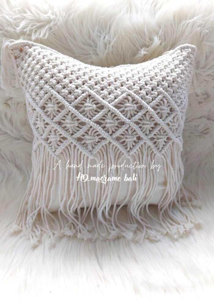 The Bali macrame pillow cover is a handcrafted home decor item, inspired by the natural beauty and cultural heritage of Bali. Made from high-quality cotton, it features a stunning geometric pattern and is both soft and durable.