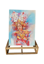 Divine Grace: A Radiant Painting of a Balinese Lady in Traditional Attire