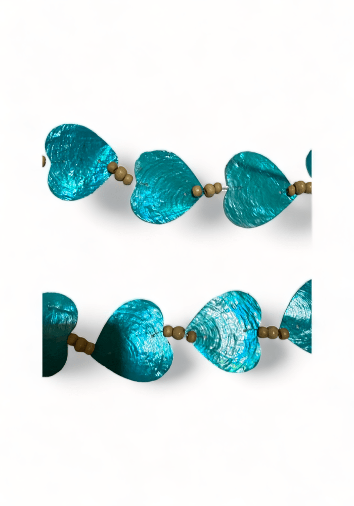 Size : 5 cm x 200 cm | Weight: 0.1 kg 🌊🐚 Experience the Enchanting Beauty of Bali with Our Handcrafted Windchime and Shell Home Decor, Made in Indonesia! 🏝️✨ Embrace the coastal charms of Bali in your living spaces with our exquisite windchimes and elegant shell decor. Each piece is meticulously crafted by skilled Balinese artisans, reflecting the serenity of the ocean and the rich cultural heritage of Indonesia. Elevate your home's ambiance with the magic of Bali - Shop Now!