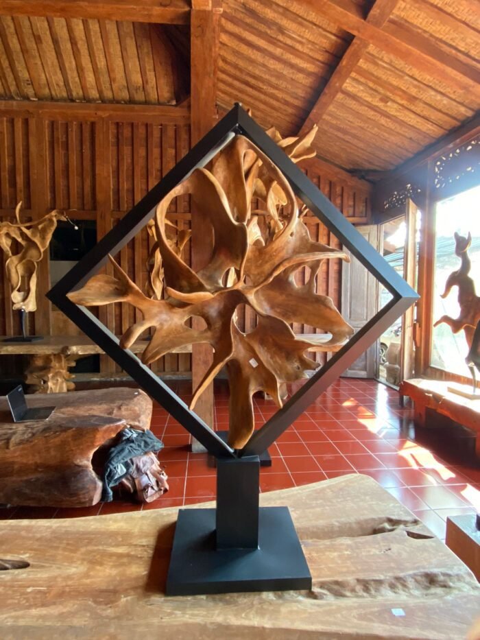 Introducing the Jati Root Home Decoration - a captivating masterpiece that blends the beauty of teak wood with the charm of Bali. Handcrafted with precision, this impressive decor piece adds elegance to your home, entrance, or hotel lobby. Its unique design reflects skilled artistry and durability. making it a versatile addition to any decor style. Embrace the allure of Bali's beauty and the timeless appeal of teak wood with this extraordinary creation. Finsihing Natural from Jati wood , Rotateable http://balibya.com/wp-content/uploads/2023/08/WhatsApp-Video-2023-08-01-at-16.29.59.mp4