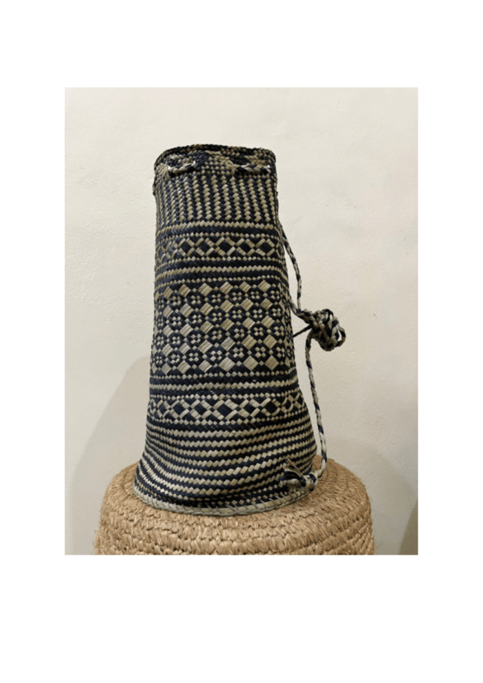 Embrace the timeless elegance of the Kambuik, a modern reinterpretation of a traditional Minangkabau bag from West Sumatera, perfect for any occasion and designed to preserve cultural heritage.