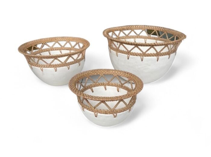 a group of white and rattan bowls