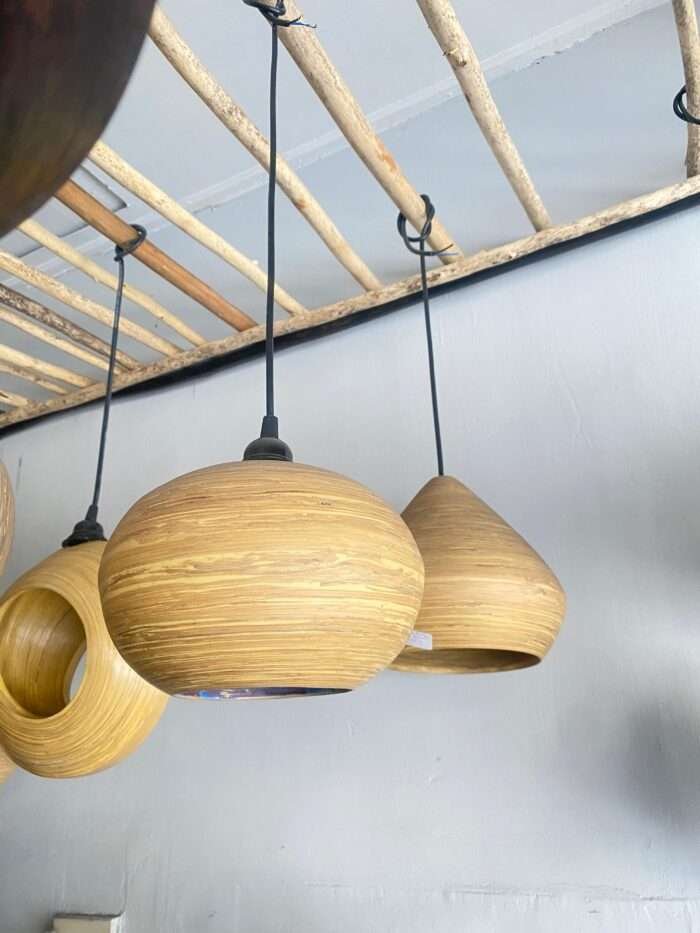 This beautifully crafted bamboo lampshade from Bali combines natural bamboo with bamboo fibers for a unique, smooth texture and warm, organic feel. Lightweight and durable, it’s perfect for eco-friendly spaces, adding soft, cozy lighting to any decor. Ideal for homes, cafes, and nature-inspired settings. <em>Minimum order: 10 pcs Diameter : 20 cm</em>