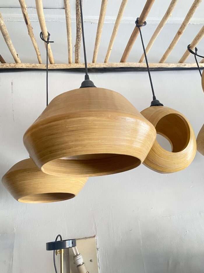 This beautifully crafted bamboo lampshade from Bali combines natural bamboo with bamboo fibers for a unique, smooth texture and warm, organic feel. Lightweight and durable, it’s perfect for eco-friendly spaces, adding soft, cozy lighting to any decor. Ideal for homes, cafes, and nature-inspired settings. <em>Minimum order: 20 pcs Size :Diameter 30 cm</em>