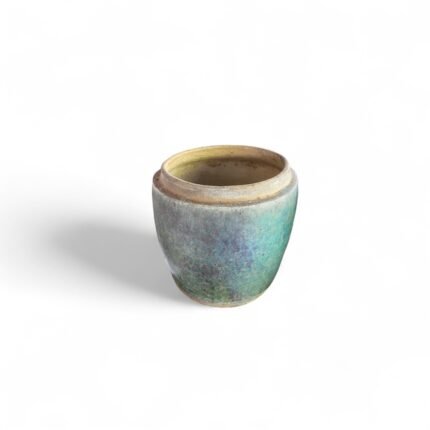Discover a rare piece of Indonesian cultural history with this Antique Rice Storage Jar from Kalimantan, a traditional vessel once essential to daily village life. Handmade from natural ceramic clay, this authentic jar tells a story of heritage, utility, and artistry passed through generations. Historically used to store rice, this jar was a staple in households across Kalimantan before modern containers became widespread. With its sturdy construction and natural breathability, it helped preserve rice in a humid tropical climate while also symbolizing abundance and sustenance. Over time, these jars have become rare, their utility replaced by modern conveniences. Yet, their aesthetic and cultural value has only increased. With visible signs of aging—subtle cracks, earthy discoloration, and natural patina—each piece is one-of-a-kind. No two jars are alike, making them deeply personal collectibles and decor pieces. These jars are ideal for: Vintage and antique collectors Interior designers seeking rustic, natural textures Hotels, resorts, and villas embracing heritage themes Artisans and cultural curators showcasing traditional objects Product Highlights: Material: Natural ceramic clay Origin: Kalimantan, Indonesia Traditional Use: Rice storage Modern Use: Decorative only Size: Approximately 30 x 20 x 20 cm Condition: Antique – includes intentional imperfections, aging marks, and heritage wear Cultural Significance: In Kalimantan households, storing rice was more than utility—it was a symbol of wealth, community, and tradition. These handmade jars played a role in family rituals and everyday nourishment. Before mass-produced plastic or metal containers, villagers relied on jars like these to safely store grains and fermented foods. Their design, often passed through generations of artisans, reflects not just form but function refined by necessity. As the world modernized, these vessels were retired from daily use but found new life as decorative collectibles that tell the story of a bygone era. Their shape, texture, and signs of use offer a deep emotional and historical connection. Ideal For: Cultural enthusiasts and heritage decorators Boho and rustic-style home interiors Bali and tropical-inspired spaces Museums, exhibitions, or learning centers focused on Southeast Asia Why It Stands Out: Culturally Significant: A vessel that embodies Kalimantan’s daily life and artisanal past. Genuinely Aged: Each jar features wear that authenticates its heritage. Handcrafted: Not factory-made, but shaped by human hands. Versatile: Looks beautiful in contemporary, rustic, and vintage interiors. How to Buy: Please send a screenshot of the jar you are interested in. These are limited, antique pieces, and each one has unique visual characteristics. If your chosen jar is no longer available, we will offer a similar item from our inventory with comparable style and authenticity. Alternatively, you can let us select a random antique jar for you based on current availability. Please chat stock availability before purchasing.